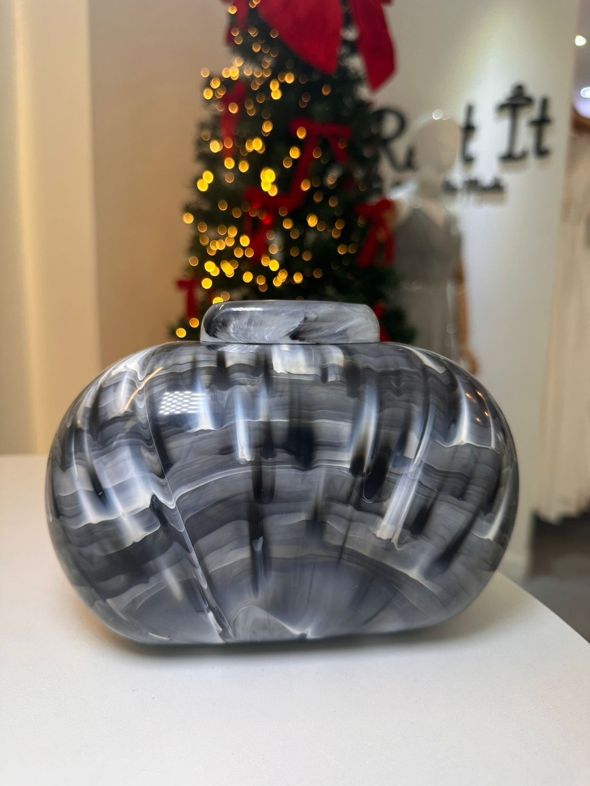 Cartera tipo Clutch Marmoleado